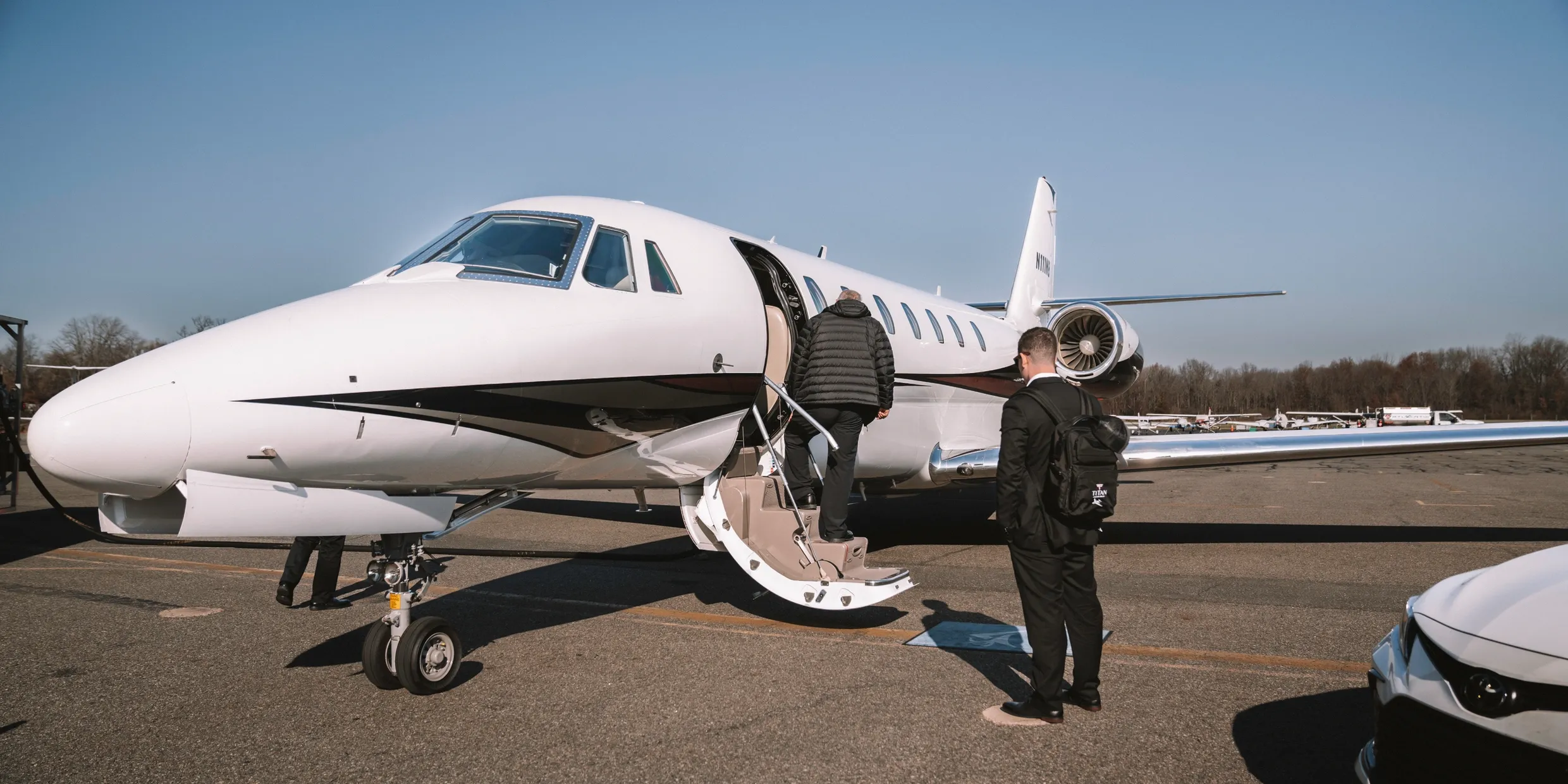 Titan Aviation Group client boarding a private jet on the apron